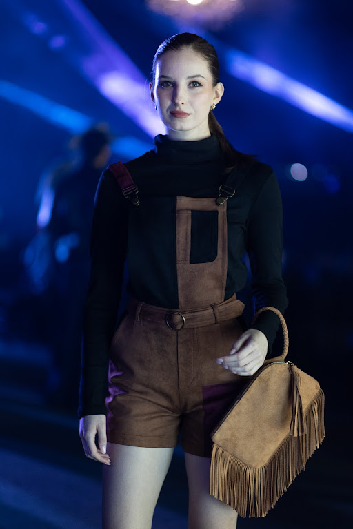 Event example photo with a dark look and structured outfit